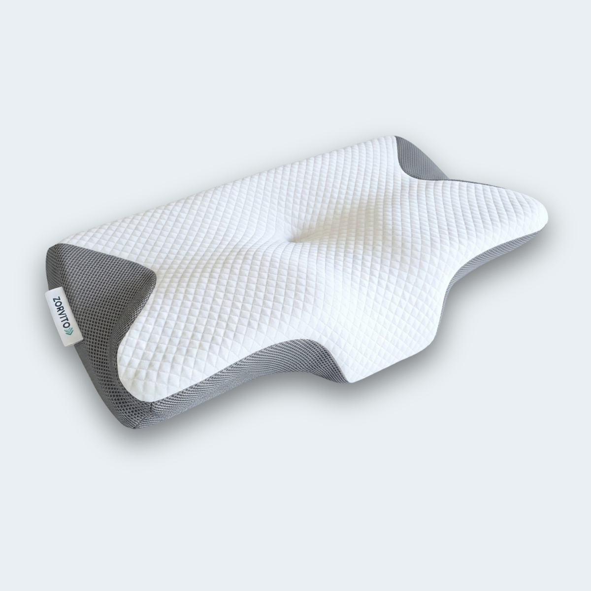 SleepFit Kissen in Grau: ergonomische Form mit Nackeneinschnitt und seitlichen Armaussparungen
